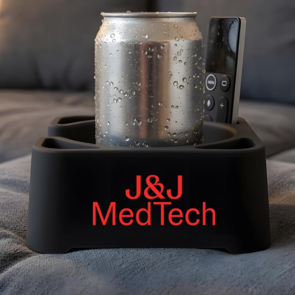 Black MugBrick with a J&J MedTech logo holding a can and a remote